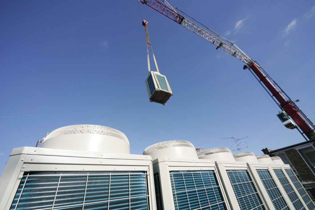 Mitsubishi Electric Air Conditioning System Being Installed By Jd Interiors In A Development In Central London Which Required A Crane Lift Due To Over Twenty Items That Required To Be Lifted Up On To The Roof, On A Saturday Morning.